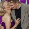 Pamela Anderson and Liam Neeson Share a Moment at ‘The Naked Gun’ Premiere in London Kiss
